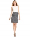 Ruched details and a stylishly contrasted bodice and skirt give Suzi Chin's cocktail dress a ton of charisma.
