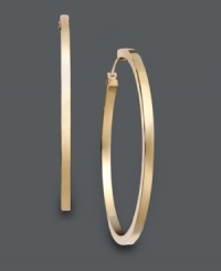 Effortlessly chic. Rich hoop earrings are an elegant and stylish final touch to any ensemble. Crafted in 14k gold. Approximate diameter: 1-5/8 inches.