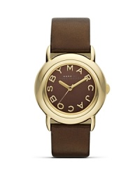 The classic workday watch is updated for the thoroughly modern Millie. Wear MARC BY MARC JACOBS' gold-cased ticker to trim on-trend tailoring in timeless style. The classic workday watch is updated for the thoroughly modern Millie. Wear MARC BY MARC JACOBS' gold-cased ticker to trim on-trend tailoring in timeless style.