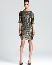 In shimmering metallic lace, Shoshanna's silk dress lends a sparkling, modern look for the season. In shimmering metallic lace, Shoshanna's silk dress lends a sparkling, modern look for the season.