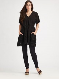 Classic eyelet and vintage-inspired embroidery come together to create the quintessential tunic. Plus, the self-tie belt will flawlessly define your shape.V-necklineElbow-length sleevesSelf-tie beltSlash pocketsAbout 32 from shoulder to hemRayonMachine washImported Classic eyelet and vintage-inspired embroidery come together to create the quintessential tunic. Plus, the self-tie belt will flawlessly define your shape.V-necklineElbow-length sleevesSelf-tie beltSlash pocketsAbout 32 from shoulder to hemRayonMachine washImported