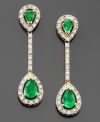 Luxury that goes to great lengths. These beautiful drop earrings features pear-cut emerald (1-3/8 ct. t.w.) and round-cut diamond (1/3 ct. t.w.) set in 14k white gold. Approximate drop: 1 inch.