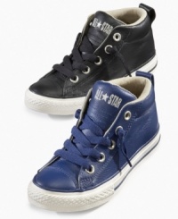 He can run the streets in these mid-top Chuck Taylor All Star street sneakers from Converse. He can run the streets in these mid-top Chuck Taylor All Star street sneakers from Converse.