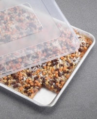 Creating just the right amount of crispy treats, brownies and cookies has never been easier on this half sheet with a natural aluminum core for even baking and great success. Handy lid pops on to keep contents safe and secure on the way to school, brunch or keep them fresh for another day. Lifetime warranty. Creating just the right amount of crispy treats, brownies and cookies has never been easier on this half sheet with a natural aluminum core for even baking and great success. Handy lid pops on to keep contents safe and secure on the way to school, brunch or keep them fresh for another day. Lifetime warranty.