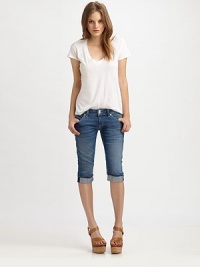 Lovingly faded stretch-fit denim, rolled at the knee in a refreshing capri crop.THE FITFitted through hips and thighsRise, about 8Inseam, about 16THE DETAILSZip flyFive-pocket styleSignature back flap pockets98% cotton/2% LycraDry cleanMade in USA of imported fabricModel shown is 5'10 (177cm) wearing US size 4. Lovingly faded stretch-fit denim, rolled at the knee in a refreshing capri crop.THE FITFitted through hips and thighsRise, about 8Inseam, about 16THE DETAILSZip flyFive-pocket styleSignature back flap pockets98% cotton/2% LycraDry cleanMade in USA of imported fabricModel shown is 5'10 (177cm) wearing US size 4.