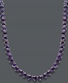 Add color to your neckline with the most regal hue. Round-cut amethysts (30 ct. t.w.) shimmer in this stunning collar necklace. Crafted in sterling silver. Approximate length: 17 inches.