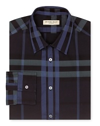 A broad check pattern blending tonal hues distinguishes this handsome dress shirt from Burberry. A broad check pattern blending tonal hues distinguishes this handsome dress shirt from Burberry.