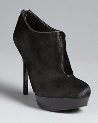Haute and simply hot, these House of Harlow 1960 platform booties stand out from the crowd, in luxe calf hair set on lofty heels. Haute and simply hot, these House of Harlow 1960 platform booties stand out from the crowd, in luxe calf hair set on lofty heels.