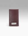Stamped calfskin money clip with magnetic closure. 1¼W X 2¾H Made in Italy