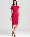 Sumptuous virgin wool takes on modern color and a sophisticated silhouette in this artful Armani Collezioni dress.