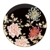 Painted Camellia brings vintage florals to life with just the right amount of color to make the dinner table unique. Draped against a gold-rimmed white canvas, delicate painted florals create a beautiful melodic feel. The salad plate, defined by a rich black background, is artfully juxtaposed to its white-bodied counterpart for a dramatic contrast.