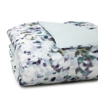 A light and lovely abstract water lily pattern in emerald green, lavender and navy breathes sweet dreams into this HUGO BOSS duvet cover. The reverse side's a cozy textured solid seafoam green. A light and lovely abstract water lily pattern in emerald green, lavender and navy breathes sweet dreams into this HUGO BOSS duvet cover. The reverse side's a cozy textured solid seafoam green.