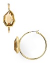 Define elegance with this pair of stone-accented hoop earrings from T Tahari. A delicate topaz colored crystal is set in a gleaming 14-karat gold setting.