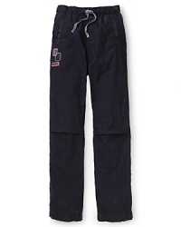 Sporty track pants by GUESS Kids get a stylish accent with logo details and a drawstring waist. Sporty track pants by GUESS Kids get a stylish accent with logo details and a drawstring waist.