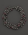 Inspired by Zen philosophy, this intricately detailed sterling silver bracelet from Paul Morelli softly jingles with meditation bells and cabochons of pink rhodalite.