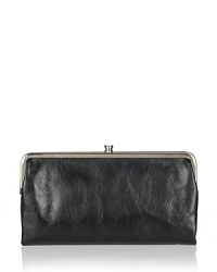 Sleek and shiny, this Hobo leather wallet is a chic home for your cash. Sleek and shiny, this Hobo leather wallet is a chic home for your cash.