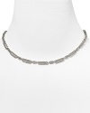 Stand out from the in-crowd in this silvery link collar necklace from Nadri, decked in delicate crystals. This vintage-inspired piece is an elegance epitomized.