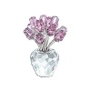 The vase and the 12 rosebuds in faceted crystal; Clear crystal stones in the middle of each bud; Rosaline colored roses. Stems rhodium plated.
