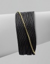 From the Chain Collection. A sizable design with sleek blackened sterling silver box link chains and an 18k gold box link chain accent. Blackened sterling silver18k goldLength, about 7Push clasp closureImported 