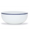 Named for a trendy Copenhagen neighborhood but designed with timeless style, the large Christianshavn Blue serving bowl features a double band of navy in pristine white porcelain. From Dansk.