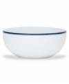 Named for a trendy Copenhagen neighborhood but designed with timeless style, the large Christianshavn Blue serving bowl features a double band of navy in pristine white porcelain. From Dansk.