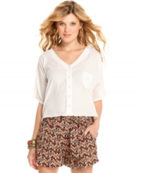 Modernize your warm-weather gear with this asymmetrical, back cutout blouse from Jessica Simpson! Modernize your warm-weather gear with this asymmetrical, back cutout blouse from Jessica Simpson!
