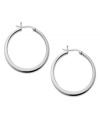 Hoops always do the trick. The perfect add-on for any look, Touch of Silver's click hoops are a must have for every collection. Crafted in silver-plated brass with a sterling silver backing. Approximate diameter: 1 inch.