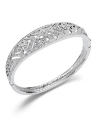 Prepare for an evening of elegance. Charter Club's sparkling accessory features an intricate filigree pattern with sparkling glass accents. Crafted in silver tone mixed metal. Item comes packaged in a signature gift box. Approximate diameter: 2-1/2 inches. Prepare for an evening of elegance. Charter Club's sparkling accessory features an intricate filigree pattern with sparkling glass accents. Crafted in silver tone mixed metal. Item comes packaged in a signature gift box. Approximate diameter: 2-1/2 inches.