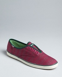Let your casual style bloom in these floral stripe print Keds Champion sneakers. Let your casual style bloom in these floral stripe print Keds Champion sneakers.