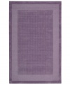 In playful purple, this charming rug will warm up any space in your home. A distinctive center grid gives the rug a delightful texture while coordinating well with casual and modern interiors. Hand-tufted of wool for premium softness and durability.