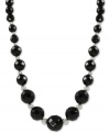 Beautiful in black. Rich onyx (6-12 mm) stands out on this sterling silver necklace with rhodium-plated sparkle beads adding a lustrous touch. Approximate length: 18 inches.