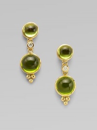 A graduated, two drop design with a dazzling diamond link. PeridotDiamonds, .06 tcw18k goldDrop, about 1Post backMade in Italy