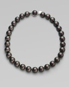 A modern take on classic chic in a bold strand of iridescent Tahitian pearls. 12MM Tahitian pearls Sterling silver Length, about 16 Push-lock clasp Made in Spain 