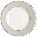 The embodiment of simplicity and grace, platinum bands and pure white stitches with raised dots adorn a pearlescent linen border. Inspired by the silk fabrics in Monique's evening gown designs, pearlized blue and tan accent colors create a look that is both elegant and beautifully serene.