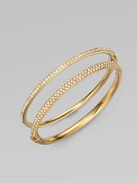 EXCLUSIVELY AT SAKS. Sparkling crystals shimmer within a glowing, golden hinged bangle. Crystal 18k goldplated Diameter, about 2¼ Push-lock clasp Imported Please note: Bracelets sold separately.