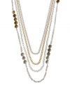 An intriguing combination. Lucky Brand's trendy layered style combines four link chains accented by two tone textured discs. Crafted in silver and gold tone mixed metal. Approximate length: 32 inches.