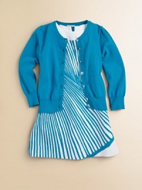 A classic long-sleeved cardigan is rendered in a soft knit and adorned with clear buttons and Pointelle trim for a timeless look.CrewneckLong sleevesButton frontPointelle detail at collar, buttons, cuffs and hem70% viscose/30% polyesterDry cleanImported Please note: Number of buttons may vary depending on size ordered. A classic long-sleeved cardigan is rendered in a soft knit and adorned with clear buttons and Pointelle trim for a timeless look.CrewneckLong sleevesButton frontPointelle detail at collar, buttons, cuffs and hem70% viscose/30% polyesterDry cleanImported Please note: Number of buttons may vary depending on size ordered.