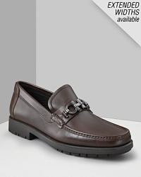 Rich leather with a practical rubber sole. Brushed silver buckle adds to its sophistication. Ferragamo is engraved in the middle of the buckle. Subtle top stitching on the front. Rich leather with a practical rubber sole. Brushed silver buckle adds to its sophistication. Ferragamo is engraved in the middle of the buckle. Subtle top stitching on the front.