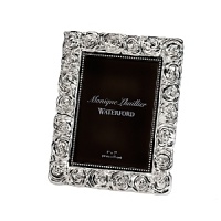 The couture designer Monique Lhuillier celebrates her first creative collaboration with Waterford Crystal with the Sunday Rose Collection. Inspired by her iconic Sunday Rose wedding gown, this sophisticated frame offers a chic way to display your cherished moments. The couture designer Monique Lhuillier celebrates her first creative collaboration with Waterford Crystal with the Sunday Rose Collection. Inspired by her iconic Sunday Rose wedding gown, this sophisticated frame offers a chic way to display your cherished moments.