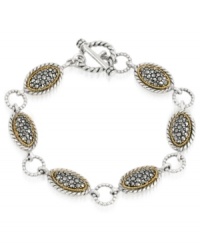 A shapely mix of sparkle and shine. Genevieve & Grace's trendy toggle bracelet features oval-shaped links crafted from sterling silver and 18k gold over sterling silver with glittering marcasite accents. Approximate length: 7-1/2 inches. A shapely mix of sparkle and shine. Genevieve & Grace's trendy toggle bracelet features oval-shaped links crafted from sterling silver and 18k gold over sterling silver with glittering marcasite accents. Approximate length: 7-1/2 inches.