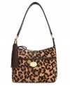 Work some wildcat print into your accessorizing with this posh purse from Tommy Hilfiger. Soft suede is accented with golden hardware and rich leather trim, for a look that's exotically alluring.