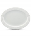 A cut above. The Castle Peak platter presents an ultra-modern take on kate spade new york's signature bow motif featuring bold faceted accents in cream-colored stoneware.
