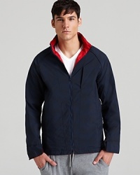 Don't get caught in the downpour without this super-thin lightweight rain jacket from NUMBER:Lab. And when you need to change things up, reverse it for an alternate look. Don't get caught in the downpour without this super-thin lightweight rain jacket from NUMBER:Lab. And when you need to change things up, reverse it for an alternate look.