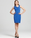 An off-kilter scoop neck lends a modern edge to this impeccably tailored Black Halo sheath dress.