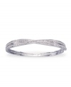 A twist on classic style, from Swarovski. Add some shimmer to your wrist with this Edith bangle bracelet featuring sparkly crystal accents. Crafted in rhodium-plated mixed metal. Approximate diameter: 3-1/4 inches.
