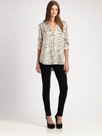 Satiny silk shirt in a trendy sleepwear-inspired silhouette, finished with an exotic snake print and shirttail hem. Notched collarButton frontSingle front patch pocketLong sleeves with buttoned cuffsShirttail hem hits below the hipsSilkDry cleanImportedModel shown is 5'9½ (176cm) wearing US size Small. Satiny silk shirt in a trendy sleepwear-inspired silhouette, finished with an exotic snake print and shirttail hem. Notched collarButton frontSingle front patch pocketLong sleeves with buttoned cuffsShirttail hem hits below the hipsSilkDry cleanImportedModel shown is 5'9½ (176cm) wearing US size Small.