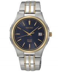 High-powered craftsmanship in a stylish presentation, by Seiko. Crafted of two-tone stainless steel bracelet and round case with gold-tone bezel. Dark blue dial with gold-tone hands, applied stick indices at markers, date window at three o'clock and logo at twelve o'clock. Solar-powered quartz movement. Water resistant to 100 meters. Three-year limited warranty. High-powered craftsmanship in a stylish presentation, by Seiko. Crafted of two-tone stainless steel bracelet and round case with gold-tone bezel. Dark blue dial with gold-tone hands, applied stick indices at markers, date window at three o'clock and logo at twelve o'clock. Solar-powered quartz movement. Water resistant to 100 meters. Three-year limited warranty.
