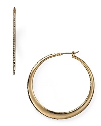 A jewel box treasure for now and forever, these classic hoop earrings are dressed up in a rim of pristine pavé crystals. From Lauren Ralph Lauren. A jewel box treasure for now and forever, these classic hoop earrings are dressed up in a rim of pristine pavé crystals. From Lauren Ralph Lauren.