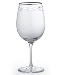 Commemorate a special anniversary with a simply elegant reminder of the time you said, I do. This radiant crystal goblet is hand-engraved with interlocking bands that symbolize the rings exchanged between bride and groom. A platinum rim provides a graceful finish. Commemorate a special anniversary with a simply elegant reminder of the time you said, I do. This radiant crystal goblet is hand-engraved with interlocking bands that symbolize the rings exchanged between bride and groom. A platinum rim provides a graceful finish.