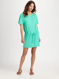 This style is everything a coverup should be: comfortable, flattering and feminine.Round neckShort sleevesPull-on styleDrawstring waist92% rayon/8% spandexDry cleanImported This style is everything a coverup should be: comfortable, flattering and feminine.Round neckShort sleevesPull-on styleDrawstring waist92% rayon/8% spandexDry cleanImported